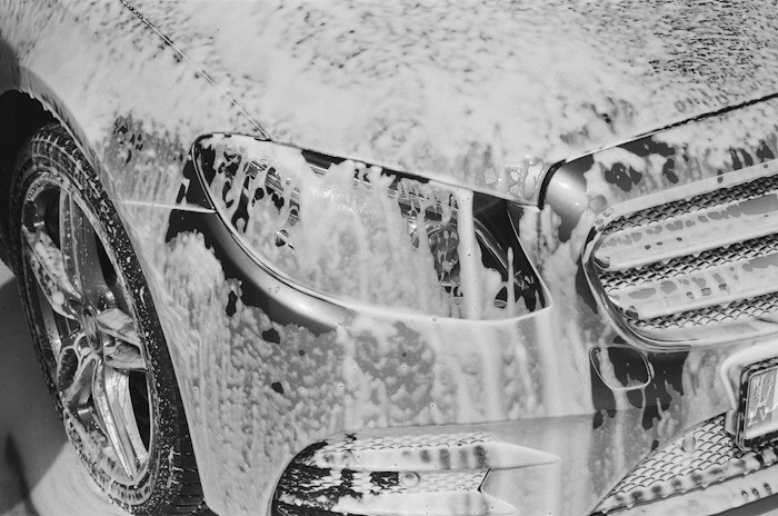 Car front covered in snow